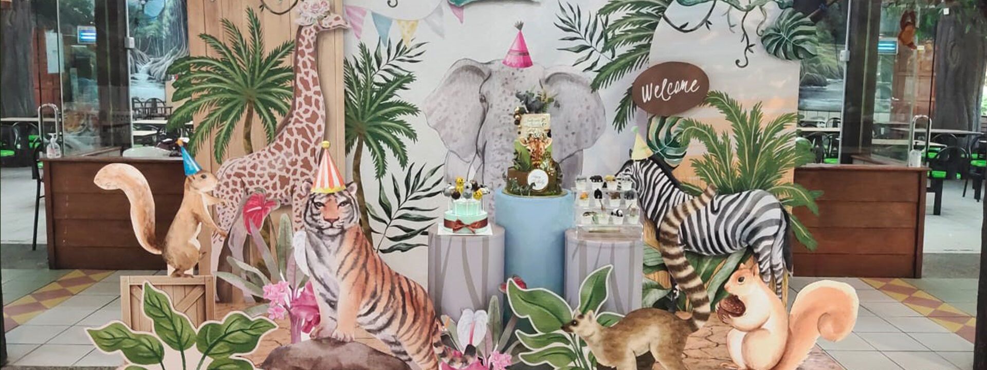 Safari-themed birthday party setup at Zoo Negara
