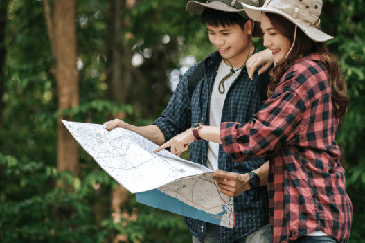Couple checking map at Zoo Negara